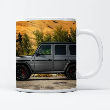 Mercedes G Class Gray SUV Mountain Backdrop