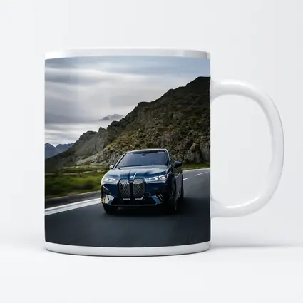 BMW iX Electric SUV Mountain Road Drive