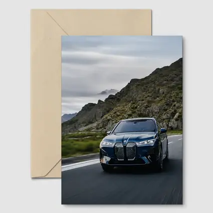 BMW iX Electric SUV Mountain Road Drive