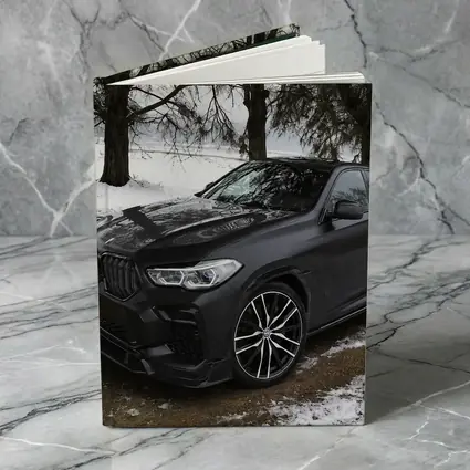 BMW X6M Matte Black Winter Snow Scene