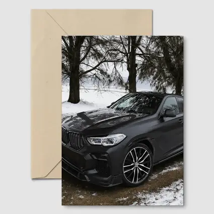 BMW X6M Matte Black Winter Snow Scene