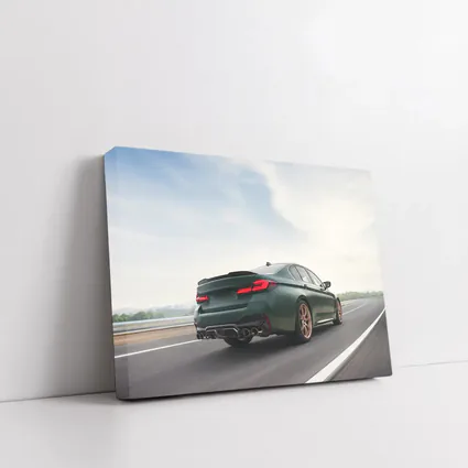 BMW M5 CS Green Sedan on Open Highway