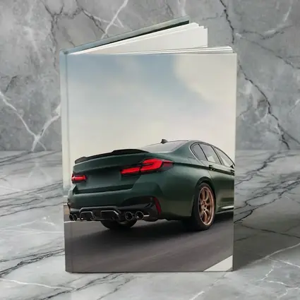 BMW M5 CS Green Sedan on Open Highway