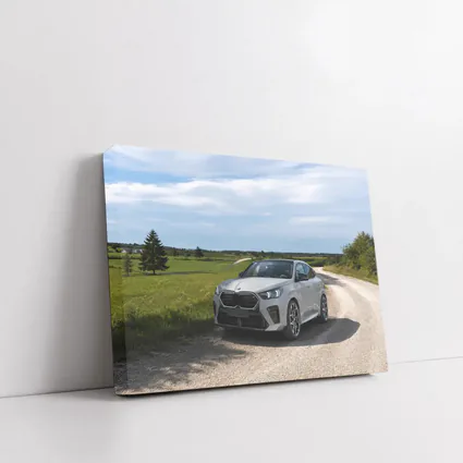 BMW X6M Silver on Rural Gravel Road