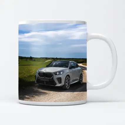 BMW X6M Silver on Rural Gravel Road