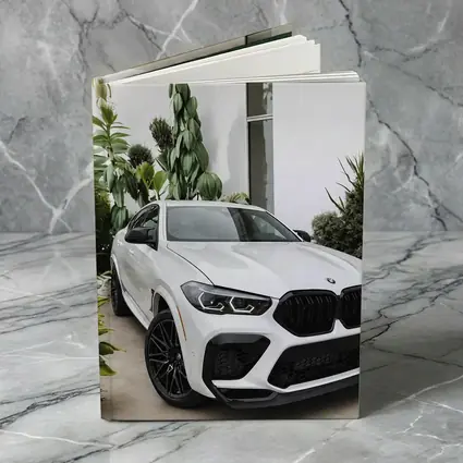 BMW X6M White SUV Tropical Plant Setting