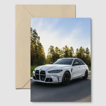 BMW M3 White Sedan on Forest Road