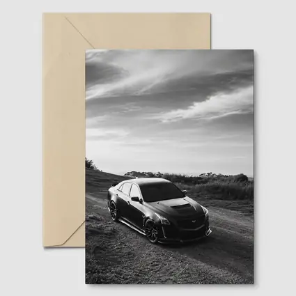 Cadillac CTS Black and White Rural Road