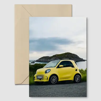 Smart Car Yellow Coastal Rocky Island Background